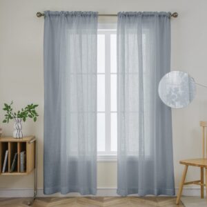 Nicely decorated event space or residential photography corner utilizing a premium set of grey floral sheer curtains.