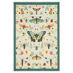 A polished residential space styled beautifully with a high-quality beige insect bathroom rug filtering daylight.