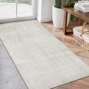 Close-up macro shot highlighting the dense weave texture and solid backing of a durable washable runner rug beige.