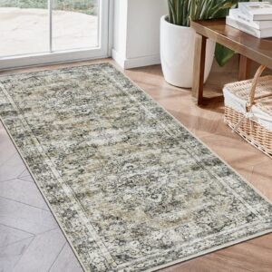 A decorative home layout emphasizing a beautiful washable runner rug tan gray laid down neatly across an elegant entryway corridor.