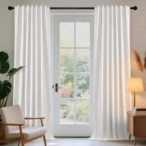 Joydeco elegant home interior display highlighting high-quality white farmhouse curtains cascading beautifully over a window setting.