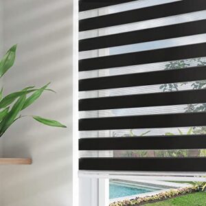 A close up look at premium zebra blinds black set up elegantly in a sunny master bedroom.