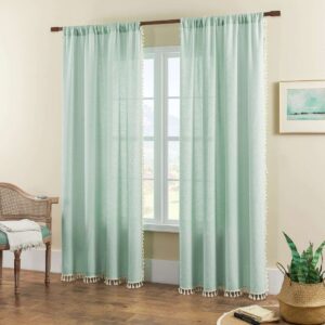 Modern residential window decor showcasing premium mint boho sheer curtains under natural morning light.
