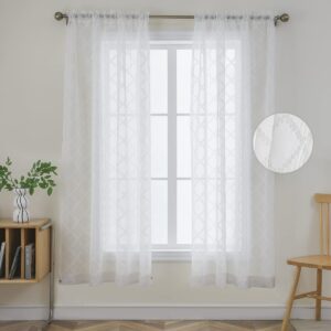 Bright contemporary window frame accenting the beautiful design of white trellis sheer curtains letting in soft natural light.