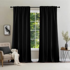 Modern residential window decor showcasing premium velvet black blackout under natural morning light.