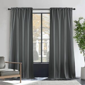 A close up look at premium velvet blackout grey set up elegantly in a sunny master bedroom.