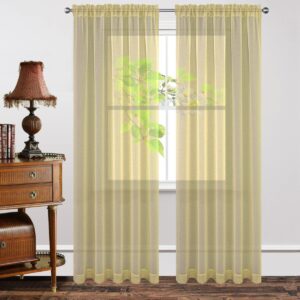 Detailed macro view highlighting the rich textile texture of clean yellow sheer curtains hung in a contemporary bedroom.