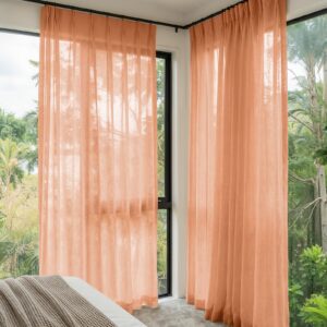 Polished apartment layout focusing on the crisp horizontal fall profile of a tailored linen sheer curtains pottery set.