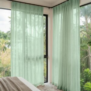 Sleek architectural space highlighting how an integrated linen sheer curtains sage green installation handles incoming reflections gracefully.