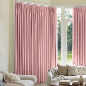Sleek architectural living zone showcasing how an integrated blackout curtains light pink setup filters intense direct afternoon solar rays.