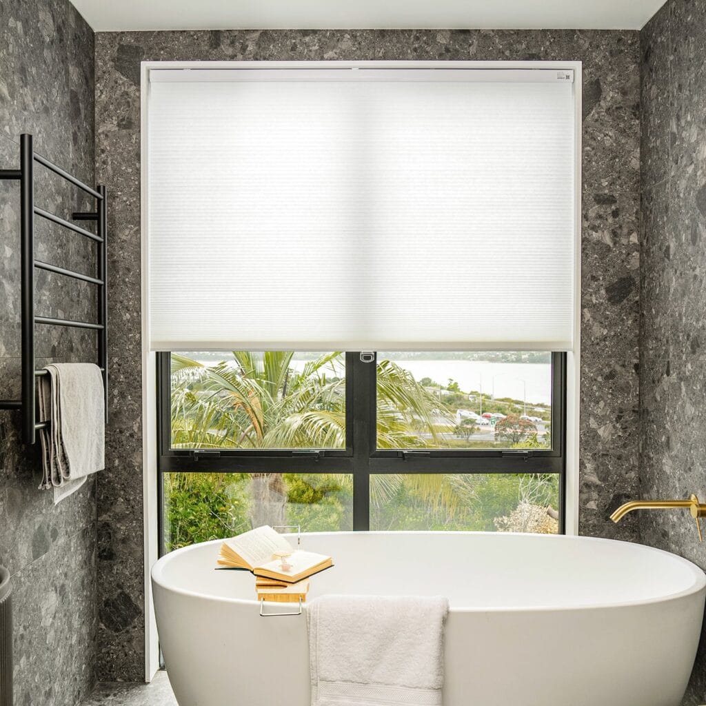 Joydeco tailored interior window treatment displaying a custom light filtering shade white setup over a contemporary layout.