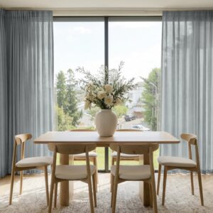 Joydeco tailored interior window treatment displaying a custom linen sheer curtain grey setup over a contemporary layout.