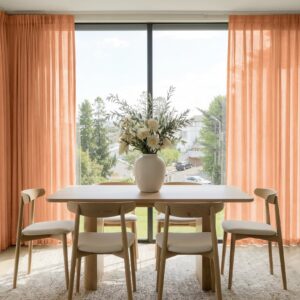 Polished apartment layout focusing on the crisp horizontal fall profile of a tailored linen sheer curtain pottery set.