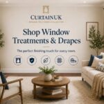 Elegant living room featuring CurtainUK window treatments with floor-to-ceiling drapes, large windows, dark hardwood floors, and stylish furniture creating a warm and sophisticated atmosphere.