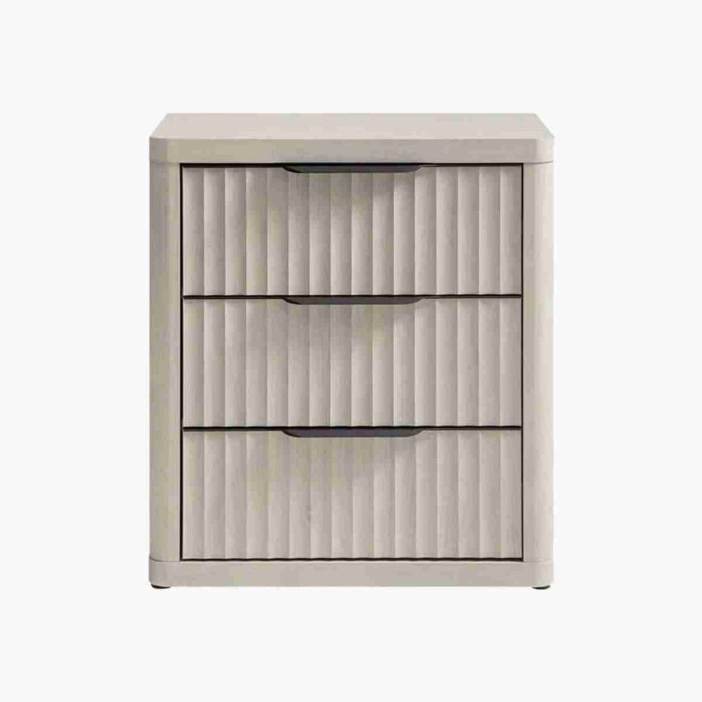 Classic white alder nightstand with three drawers for bedroom organization.