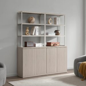 Bright room featuring bookshelf in white alder 2 door with versatile storage and display space.