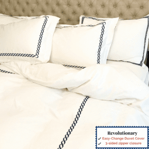 white embroidered duvet cover  photographed with coordinating bedding