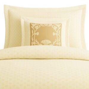 beige duvet cover arranged on a neatly made bed