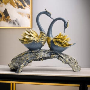 Intricately crafted Blue Gold Swan Sculpture adding elegance and charm to any decor.