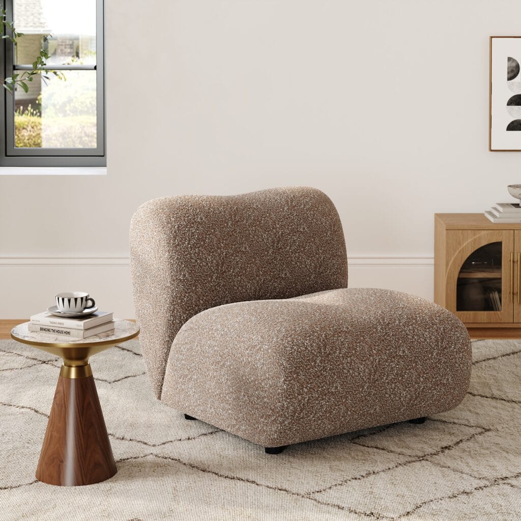 The Sicotas Collection 11 Sculptural boucle accent chair upholstered in soft, textured fabric for modern comfort.