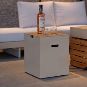 Sleek Tevara propane tank cover table that conceals gas tank and serves as a side table.