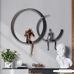 Abstract human figures in black and gold within round frames, ideal modern wall art decor.