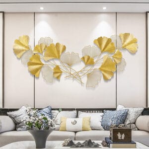 Botanical style metal ginkgo leaves wall decor featuring five metallic gold leaf fans.