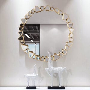 Modern geometric round wall mirror featuring a central large mirror surrounded by smaller irregular mirrors.