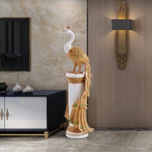 Luxurious resin peacock floor sculpture decor featuring gold and emerald colors for elegant home styling.