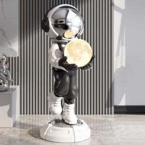 Unique astronaut floor lamp decor featuring a glowing moon globe for adjustable lighting.