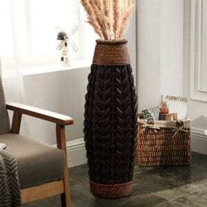 Vintage rustic tall woven bamboo vase designed for dried or silk flowers.