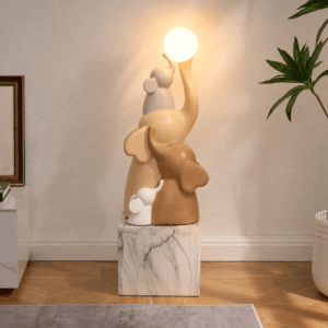 Artistic elephant sculpture with LED features a rechargeable globe and remote control.