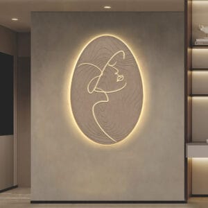 Elegant modern LED wall art featuring a line-drawn female profile on a warm backdrop.