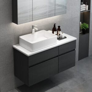 Modern floating bathroom vanity featuring a stone resin top and spacious soft-close drawer.