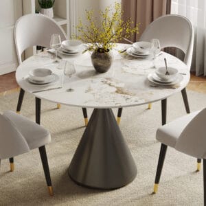 Stylish round dining table featuring a sintered stone surface for durable everyday use.