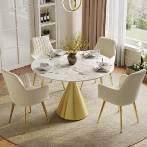 Stylish round dining table with gold base featuring a sintered stone surface.