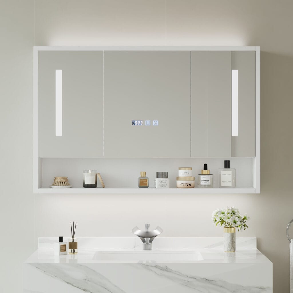 The Sicotas Collection 63 Sleek 39-inch white LED medicine cabinet featuring three mirrored doors and integrated lighting.