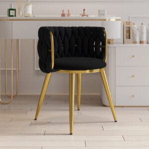 Sleek velvet barrel back dining chair with high-density foam padding for comfort.