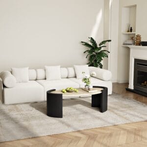 A captivating natural beige oval travertine coffee table enhancing your living room decor.