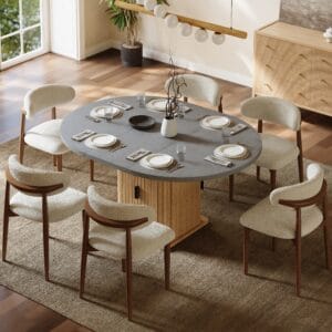 Sleek gray extendable dining table set features a concrete-gray top and fluted base.