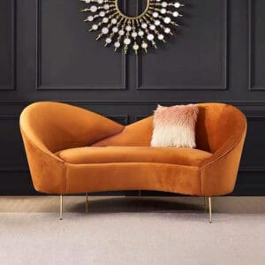 Soft velvet curved 2-seater sofa upholstered with high-density foam for luxurious comfort.