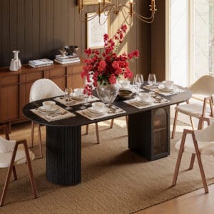 Stylish oval dining table with storage features a faux travertine top and hidden compartments.