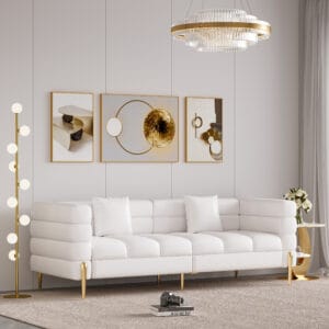 Elegant modern white leather sofa featuring tufted design and deep seating for comfort.