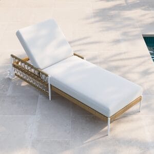 Relax on our stylish outdoor lounge chair with wheels featuring plush cushions and a white finish.