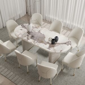 Modern oval extendable dining table featuring a durable sintered stone top.