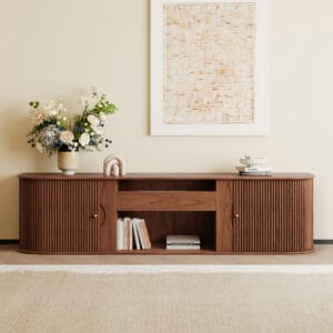 Stylish ash wood TV stand featuring fluted tambour doors and hidden storage compartments.