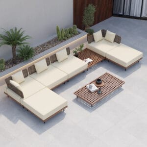 Stylish outdoor sectional sofa set featuring creamy upholstery and warm teak accents.