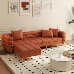 Modern elegance embodied in a faux leather modular couch with tufted silhouette and gold-tone legs.