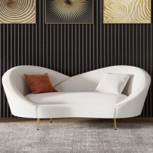 Plush modern white velvet curved sofa with slender metal legs for stylish comfort.