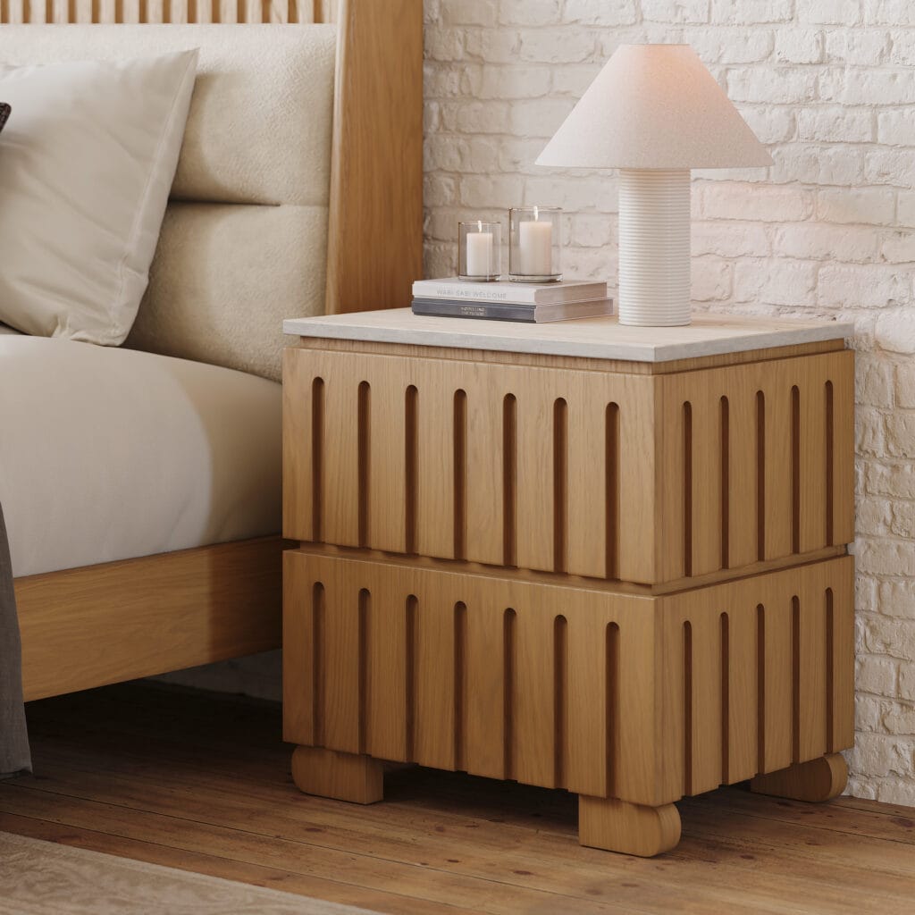 Elegant two-drawer ash wood nightstand with fluted panels and faux travertine top.